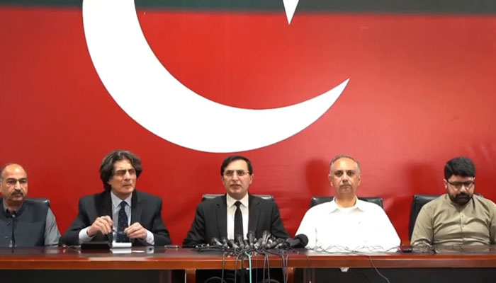 PTI Chairman Gohar Ali Khan (centre), Secretary General Omar Ayub Khan (centre-right), and Secretary Information Raoof Hasan (centre-left) address the press conference on March 12, 2024 in this still taken from a video. — Facebook/@PTIPunjabPK