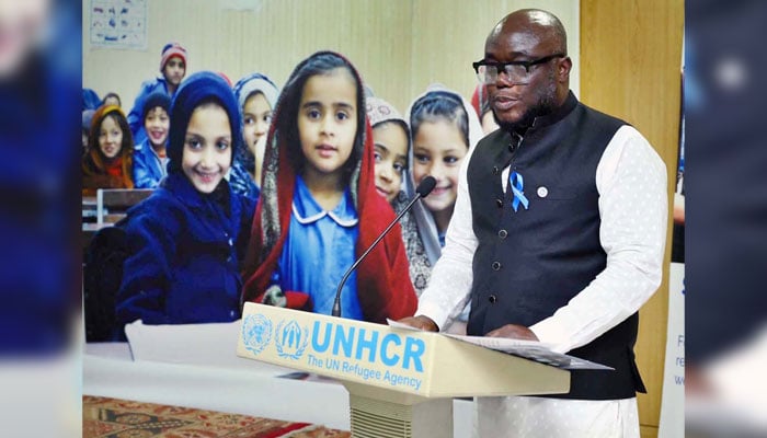 Head of UNHCR Sub-office Peshawar Mr Kofi Ohenenana Dwomo addresses during the ceremony on World Refugee Day on June 27, 2024. — APP