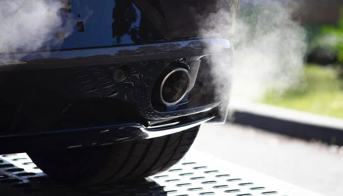 A representational image showing smoke emanating from a car. — Unsplash/File