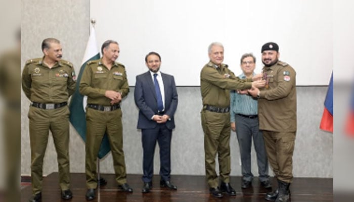 IG Punjab Dr Usman Anwar awards Ghazi medal to the officer for their exemplary courage and dedication to duty on June 27, 2024. — Facebook/Punjab Police Pakistan