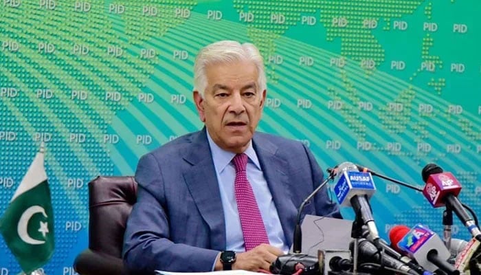 Defence Minister Khawaja Asif addresses a press conference in Islamabad. — PID/file