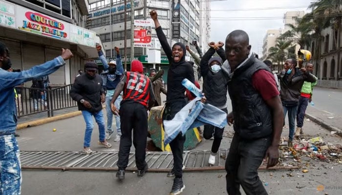 People react at a demonstration over police killings of people protesting against Kenyas proposed finance bill 2024/2025, in Nairobi, Kenya, June 27, 2024. — Reuters