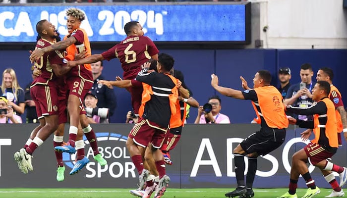Venezuela forward José Salomón Rondón celebrates with his teammates after scoring a goal on a penalty during the second half a match against Mexico at SoFi Stadium Inglewood, CA, USA on June 26, 2024. — Reuters