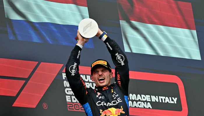 Max Verstappen celebrates with the trophy on the podium after winning the Emilia Romagna Grand Prix. — Reuters/file