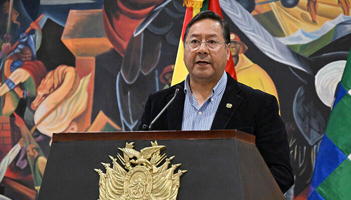 Bolivian President Luis Arce talks to the media during a press conference in La Paz on June 27, 2024. — AFP