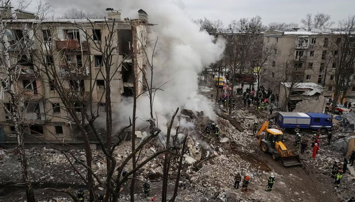 Rescuers work at a site of a residential building heavily damaged during a Russian missile attack, amid Russias attack on Ukraine, in Kharkiv, Ukraine January 23, 2024. — Reuters