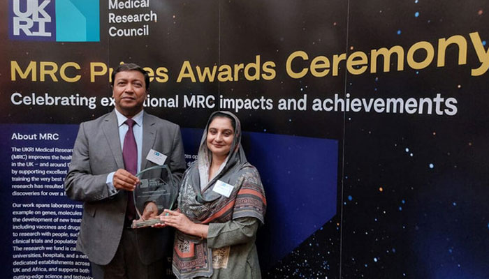 In this image, Prof Dr M Iqbal Choudhary (left) and Prof Dr Sammer Yousuf gesture for a photo after they receive the “Outstanding Team Impact Prize” from the UK’s Medical Research Council on June 30, 2024. — APP