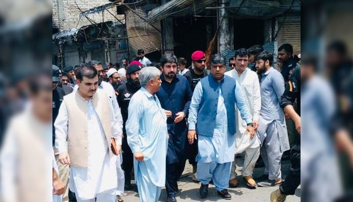 Chief Secretary of Khyber Pakhtunkhwa, Nadeem Aslam Chaudhary, visits the site of the recent fire in Nauthia locality on June  30, 2024. — Facebook/Chief Secretary Khyber Pakhtunkhwa