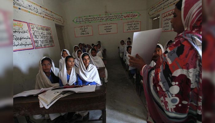 In this representational image, a teacher attends toa class at school in Sindh. — Reuters/File
