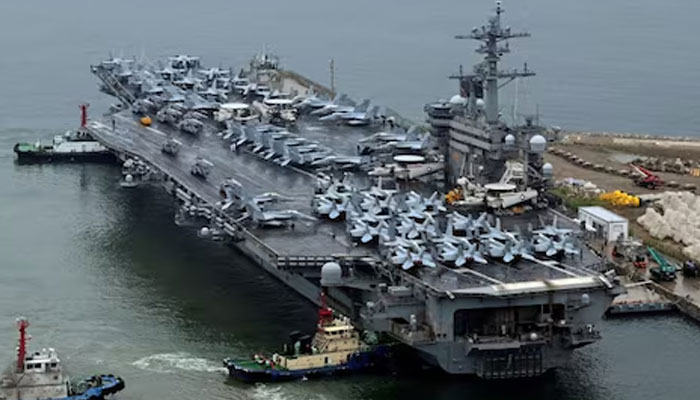 A nuclear-powered US aircraft carrier, the Theodore Roosevelt, arriving in the South Korean port city of Busan earlier this month to take part in joint military exercises with the host nation and Japan.— Reuters/file