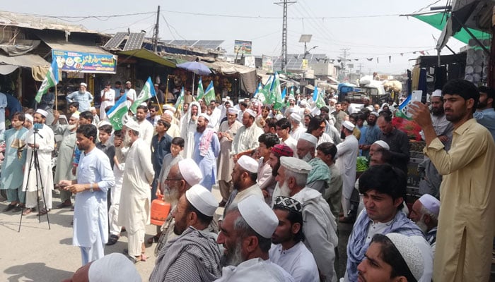 People can be seen in a protest rally, organised by Jamaat-e-Islami (JI) in Bajaur district, against possible military operation in the merged areas on Jun 30, 2024. —  Facebook/jibajaurofficial1