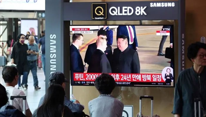 People watch a TV broadcasting a news report on Russian President Vladimir Putin’s visit to North Korea, in Seoul, South Korea, June 19, 2024. — Reuters