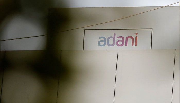 The logo of the Adani Group is seen on one of its buildings in Ahmedabad, India, January 27, 2023. — Reuters