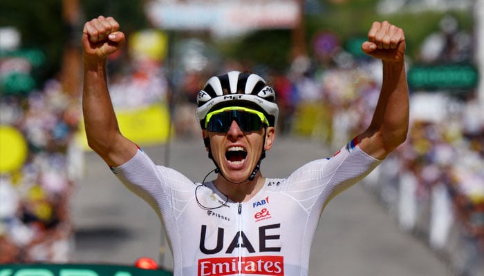UAE Team Emirates Tadej Pogacar crosses the finish line to win stage 4 Tour de France Pinerolo to Valloire in Valloire, France on July 2, 2024 . — Reuters