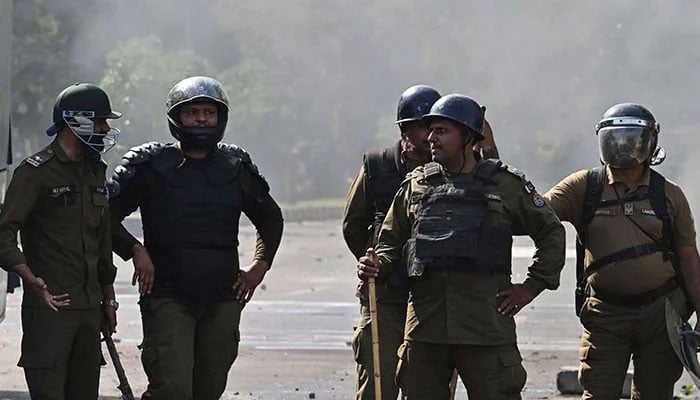 Punjab Police personnel stand guard in Lahore. — APP/File