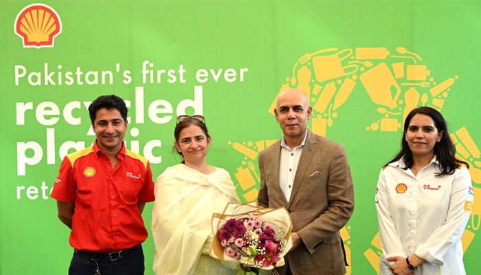 Participants pose for a group photos at an even organised by Shell Pakistan Limited. — Supplied