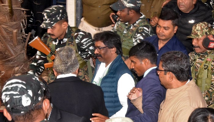 Hemant Soren, former chief minister of the eastern state of Jharkhand, is escorted by security personnel as he leaves court following his arrest late by Indias financial crimes agency, in Ranchi, India, February 1, 2024. — Reuters