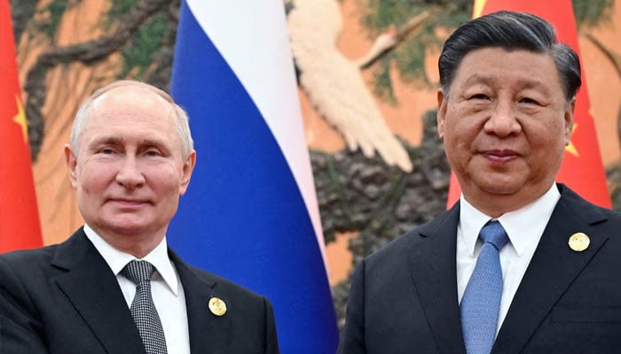 Russian President Vladimir Putin shakes hands with Chinese President Xi Jinping during a meeting at the Belt and Road Forum in Beijing, China, October 18, 2023. — Reuters