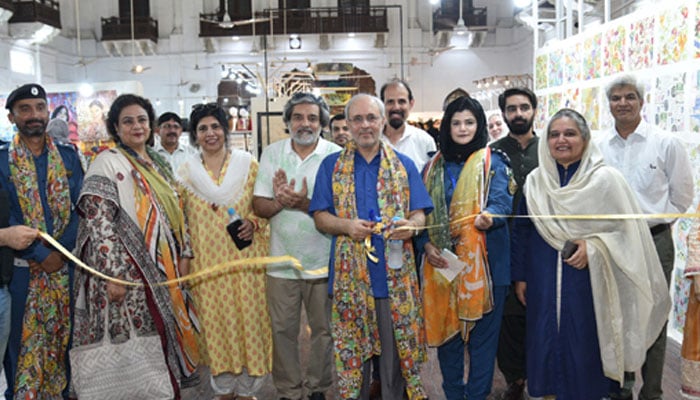 Punjab University Vice Chancellor Prof Dr Khalid Mahmood inaugurates a degree show for BFA students organised by the PU College of Art and Design’s Department of Textile Design. — PU website/File