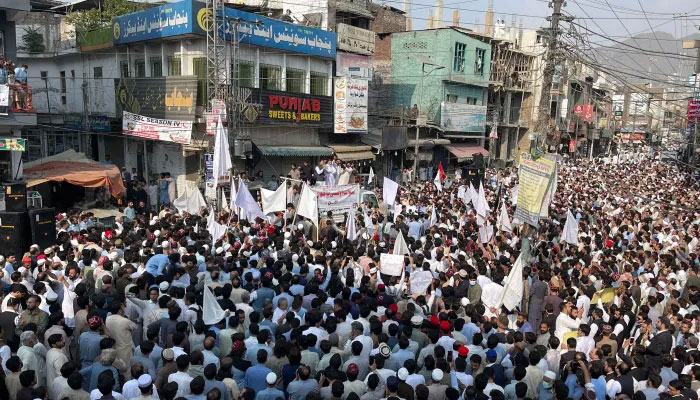 Residents take part in a protest a day after an attack on a school bus in the Swat Valley in Pakistan. — AFP/file