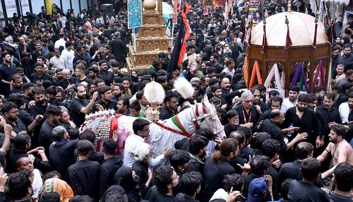 A large number of mourners participate in the main Muharram procession in Lahore. — APP/file