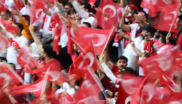 Turkey supporters in colourful support of their country in the last-16 Euro 2024 victory against Austria. — AFP/file