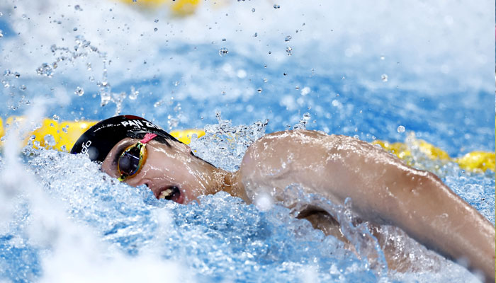 Chinas Pan Zhanle in action during the mens 4x100m freestyle relay heats at Aspire Dome, Doha, Qatar on February 11, 2024. — Reuters