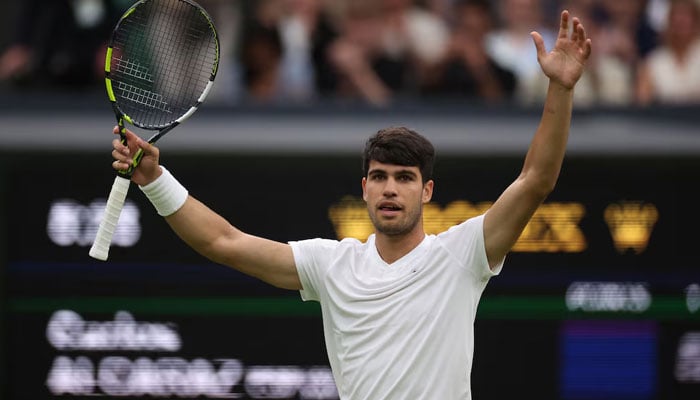 Spains Carlos Alcaraz celebrates after winning his third round match against Frances Tiafoe during Wimbledeon match in London on July 5, 2024. — Reuters