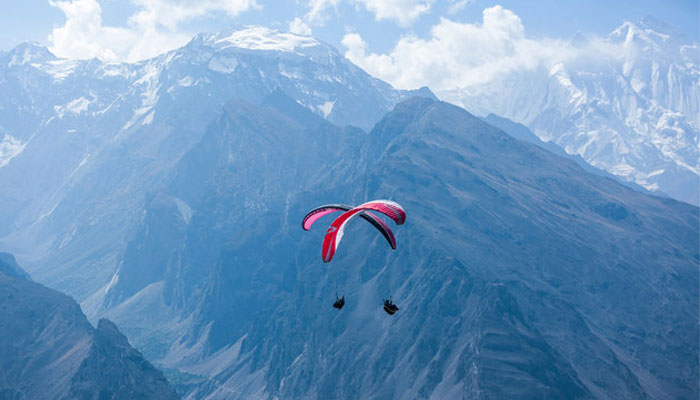 The file photograph posted on October 21, 2019, shows a paraglider airborne in Pakistans Gilgit-Baltistan region. — GB Paragliding & Hang Gliding Association/File