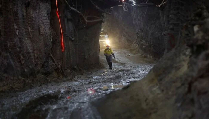 Representational image of a miner seen walking in a mine. — Reuters/File