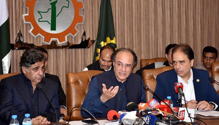 Federal Minister for Finance & Revenue, Muhammad Aurangzeb talking to media persons after meeting with the Business community at FPCCI on July 6, 2024. — APP