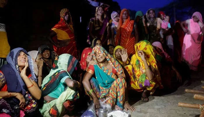 Relatives mourn the death of stampede victims Kamlesh Jatav, 22, and her seven-month-old daughter in Daunkeli village, Hathras district, in the northern state of Uttar Pradesh, India, on July 3, 2024. — Reuters