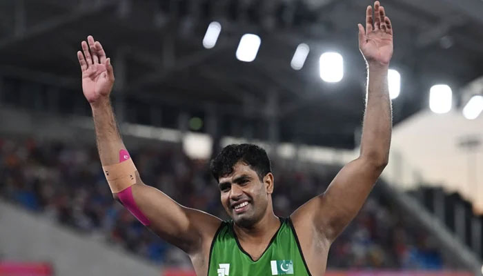 Arshad Nadeem raises his hands after competing in a javelin throw event. — AFP/file