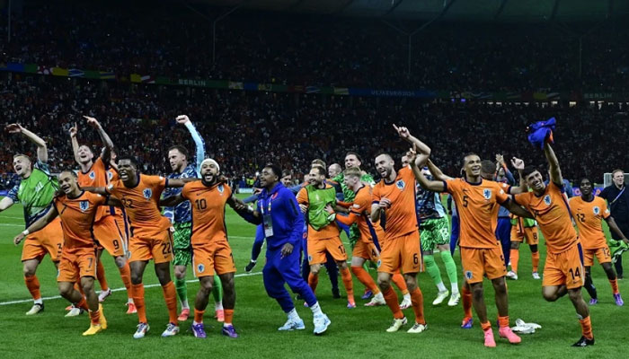 Netherlands players celebrate after the UEFA Euro 2024 quarter-final football match between the Netherlands and Turkey at the Olympiastadion in Berlin on July 6, 2024. — AFP