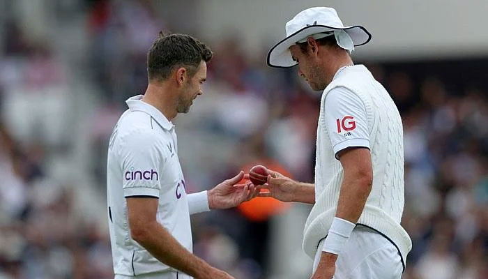 Englands James Anderson (L) and Stuart Broad (R) seen during a match. — AFP/file