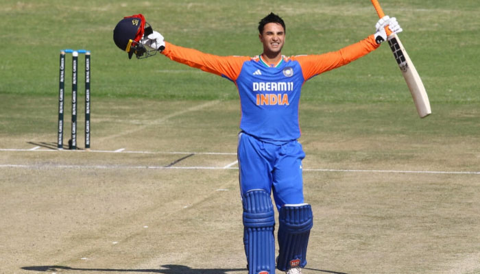 Abhishek Sharma celebrating his first international century against Zimbabwe on July 7, 2024.— AFP