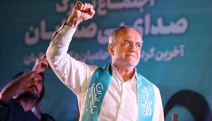 Irans President-Elect Masoud Pezeshkian waves during a campaign event in Tehran, Iran, July 3, 2024. — Reuters