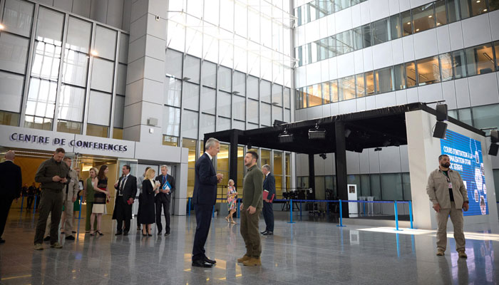 This handout photograph taken and released by Ukrainian Presidential Press Service on June 27, 2024, shows Ukrainian President Volodymyr Zelensky (right) and NATO Secretary General Jens Stoltenberg (left) as they speak during their meeting at NATO Headquarters in Brussels. — AFP