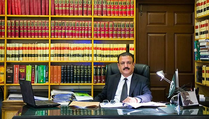 Justice Tariq Mehmood Jahangiri in his own office on July 14, 2023. — Facebook/Jahangiri Law Associates