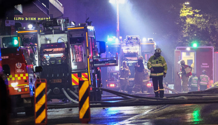 A representational image showing firemen working at the scene of a fire at a building in Sydney on May 25, 2023. — AFP