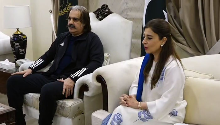 Chief Minister of Khyber Pakhtunkhwa Ali Amin Khan Gandapur (L)  meets with the Prime Ministers Focal Person for Polio Eradication Senator Ayesha Raza Farooq on July 8, 2024. — Screengrab via Facebook/Chief Minister Khyber Pakhtunkhwa