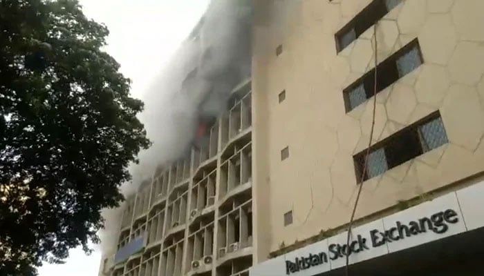 Smoke arises from the fourth floor of the PSX building in Karachi on July 8, 2024. — Screengrab via Geo News