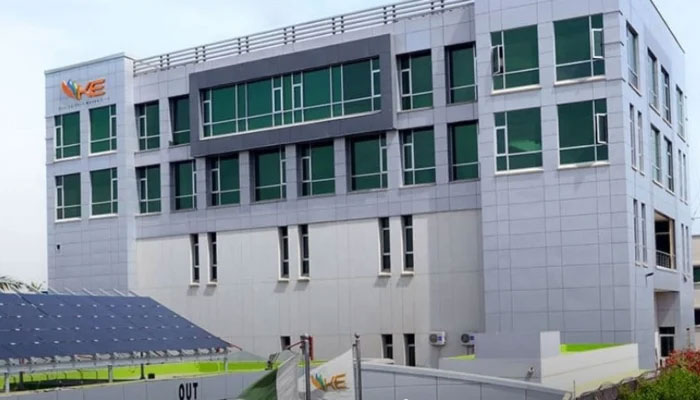 A view of the K-Electric head office, with solar panels at the parking area, in Karachi. — K-Electric website/ File