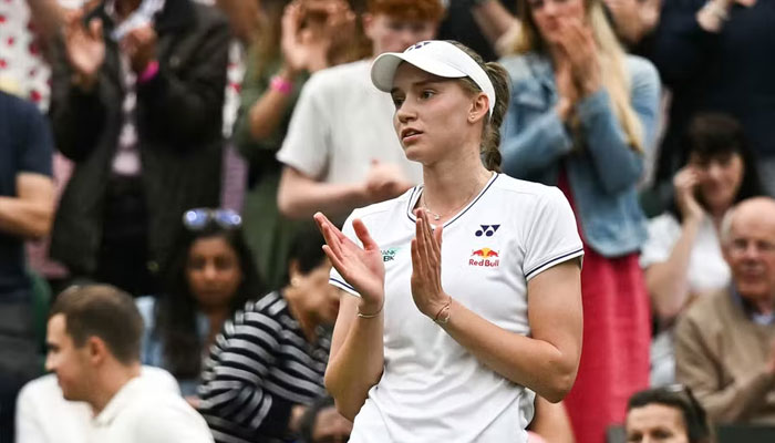 Former champion Elena Rybakina acknowledges the Wimbledon crowd after her win.— AFP/file