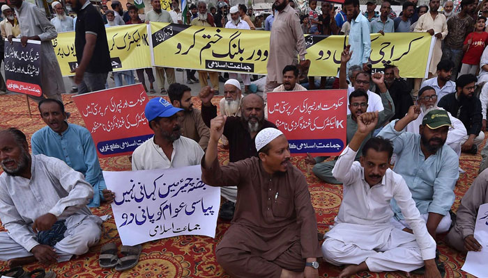 Activates of Jamat e Islami hold protest against K Electric at Orangi Town Islam Chowk on July 8, 2024. —INP