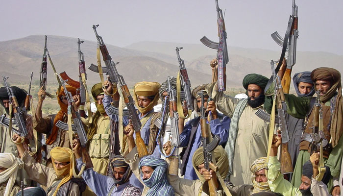 Baloch rebels hold their weapons as they pose for a photograph. — Reuters/File