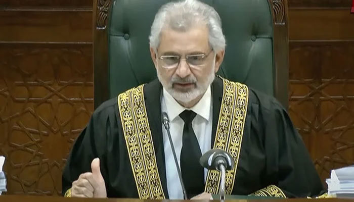 CJP Qazi Faez Isa announcing verdict on petitions against Supreme Court (Practice and Procedure) Act 2023, on October 11, 2023, in this still taken from a video. — State media