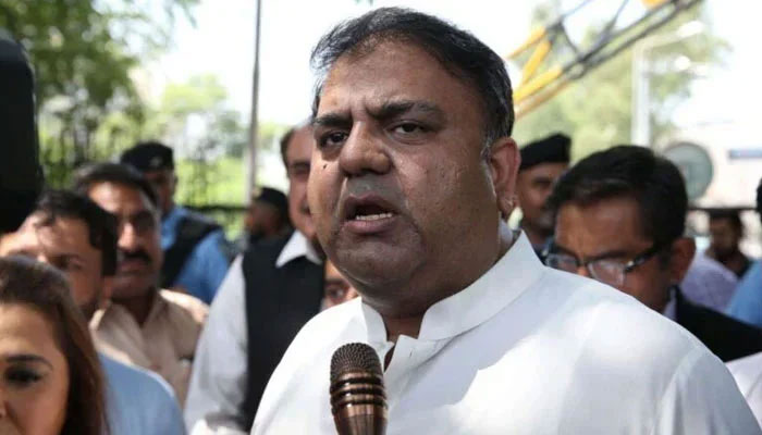 Former federal minister Fawad Chaudhary speaks to media persons. — APP/File