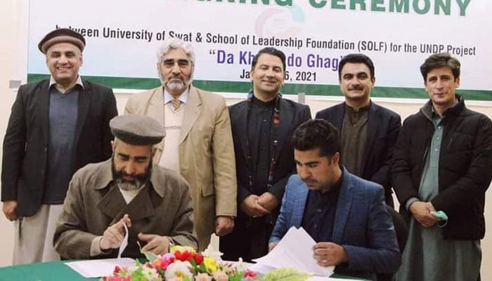 Vice-Chancellor Prof. Dr. Hassan Sher and National Coordinator for IUCPSS Pakistan Muhammad Murtaza Noor signing MoU in University of Swat seen in this image. — Website/uswat.edu.pk/file