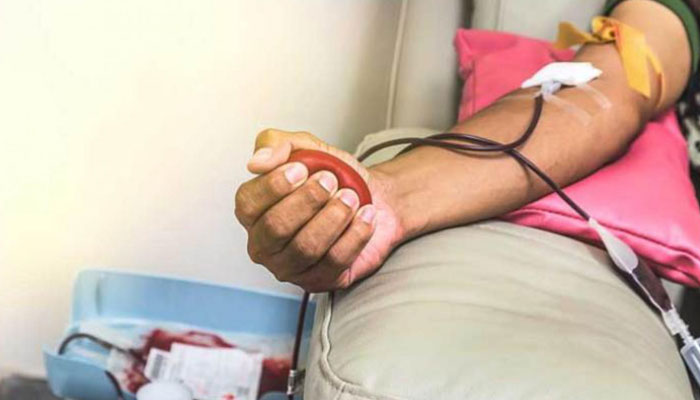 In this undated photo, a man is donating blood. —WHO website/File